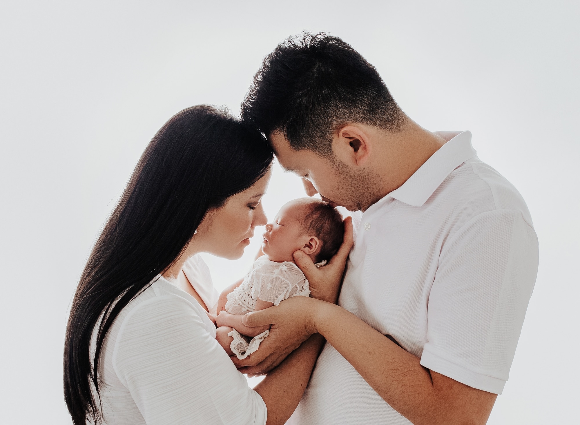 Parents with newborn photo